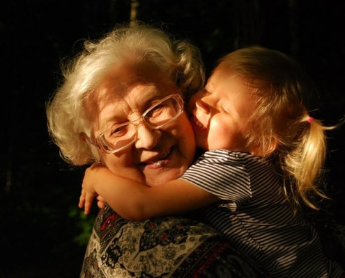 Should I transfer my home to my children - Featured image - mother and child